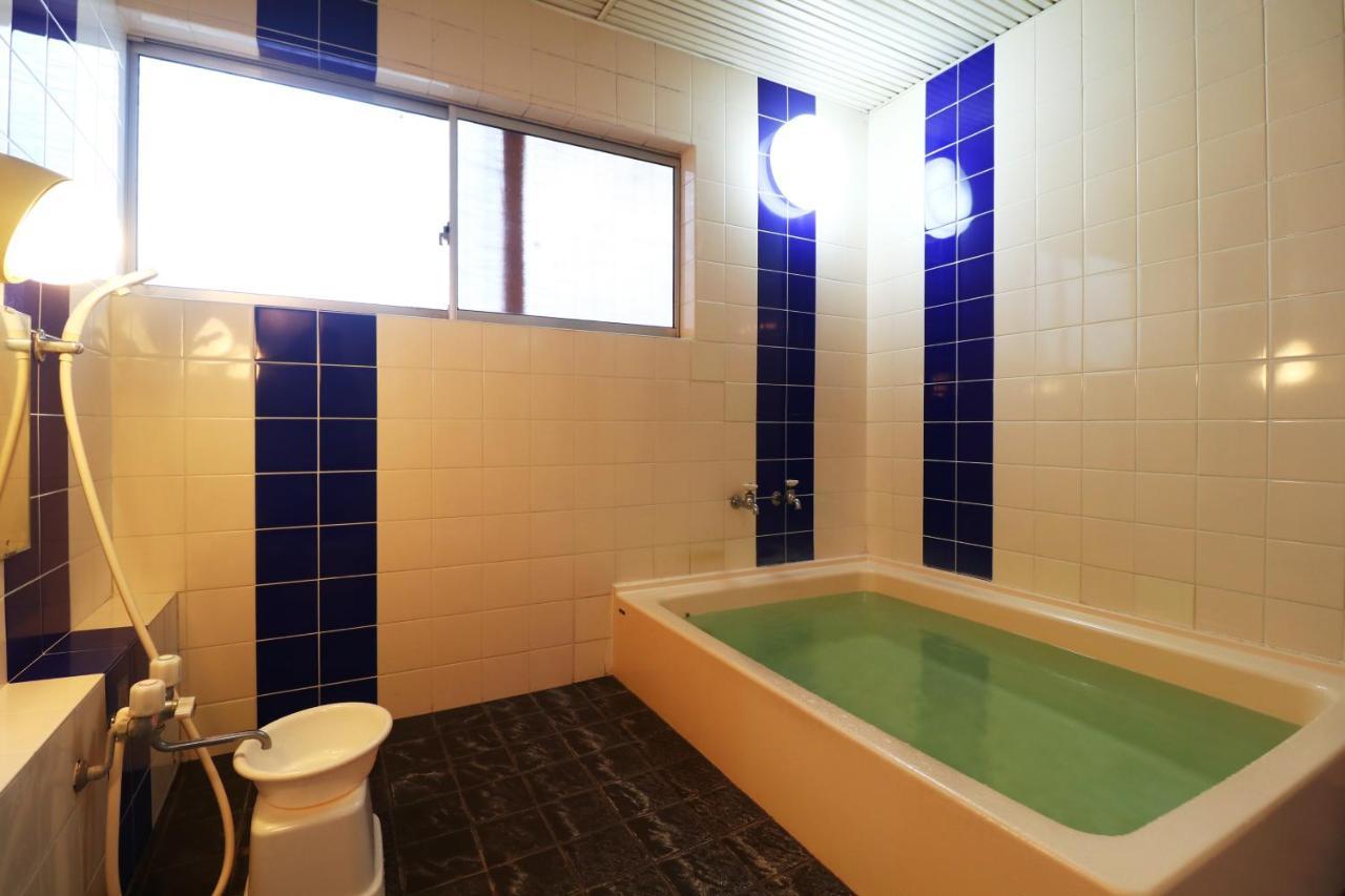 Iris Yu Hotel Хирайзуми Екстериор снимка