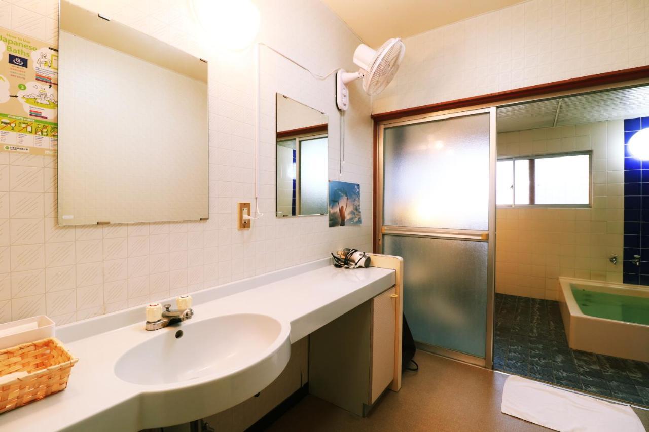 Iris Yu Hotel Хирайзуми Екстериор снимка
