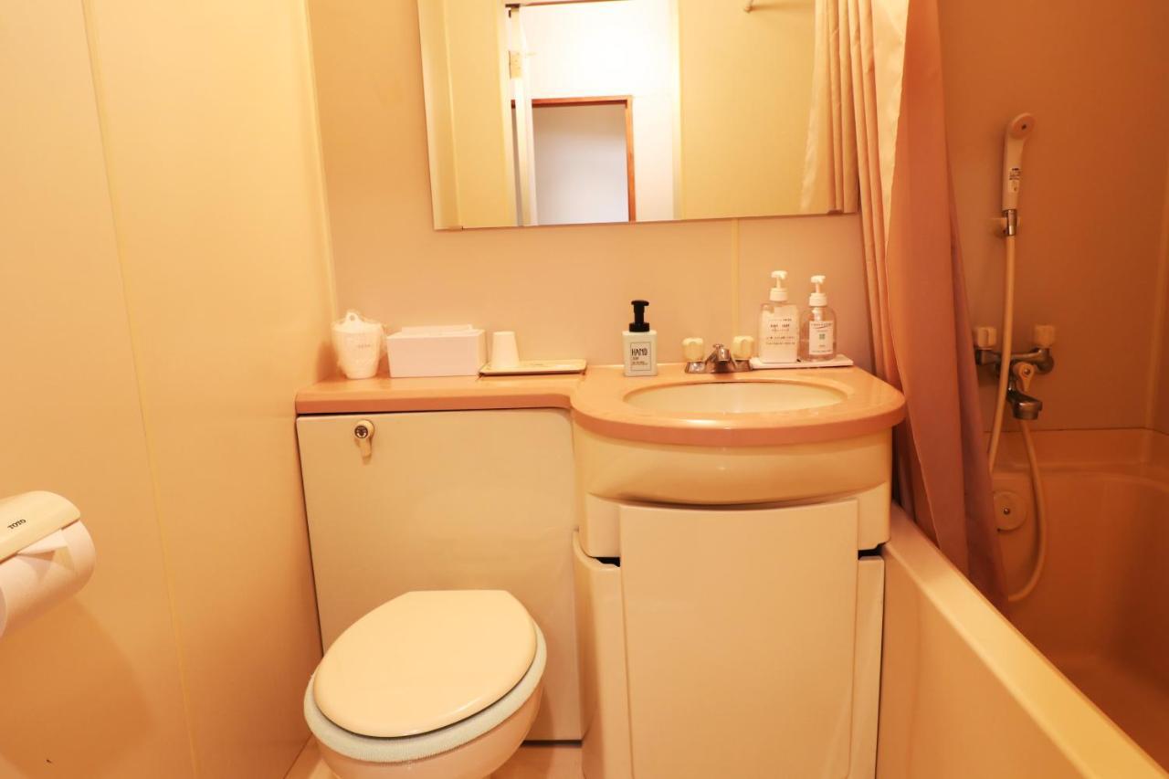 Iris Yu Hotel Хирайзуми Екстериор снимка