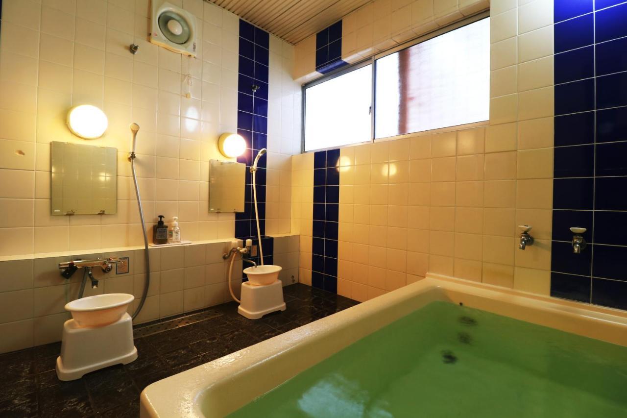 Iris Yu Hotel Хирайзуми Екстериор снимка