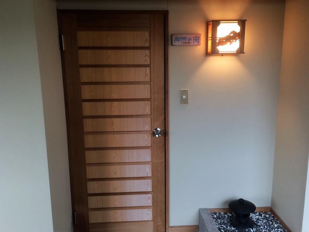 Iris Yu Hotel Хирайзуми Екстериор снимка