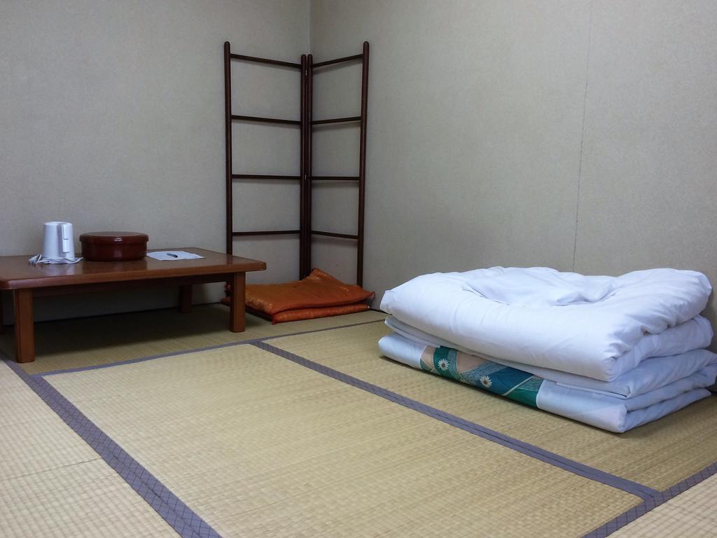 Iris Yu Hotel Хирайзуми Екстериор снимка