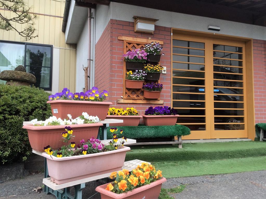 Iris Yu Hotel Хирайзуми Екстериор снимка